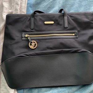 Black Michael Kors nylon shoulder bag.